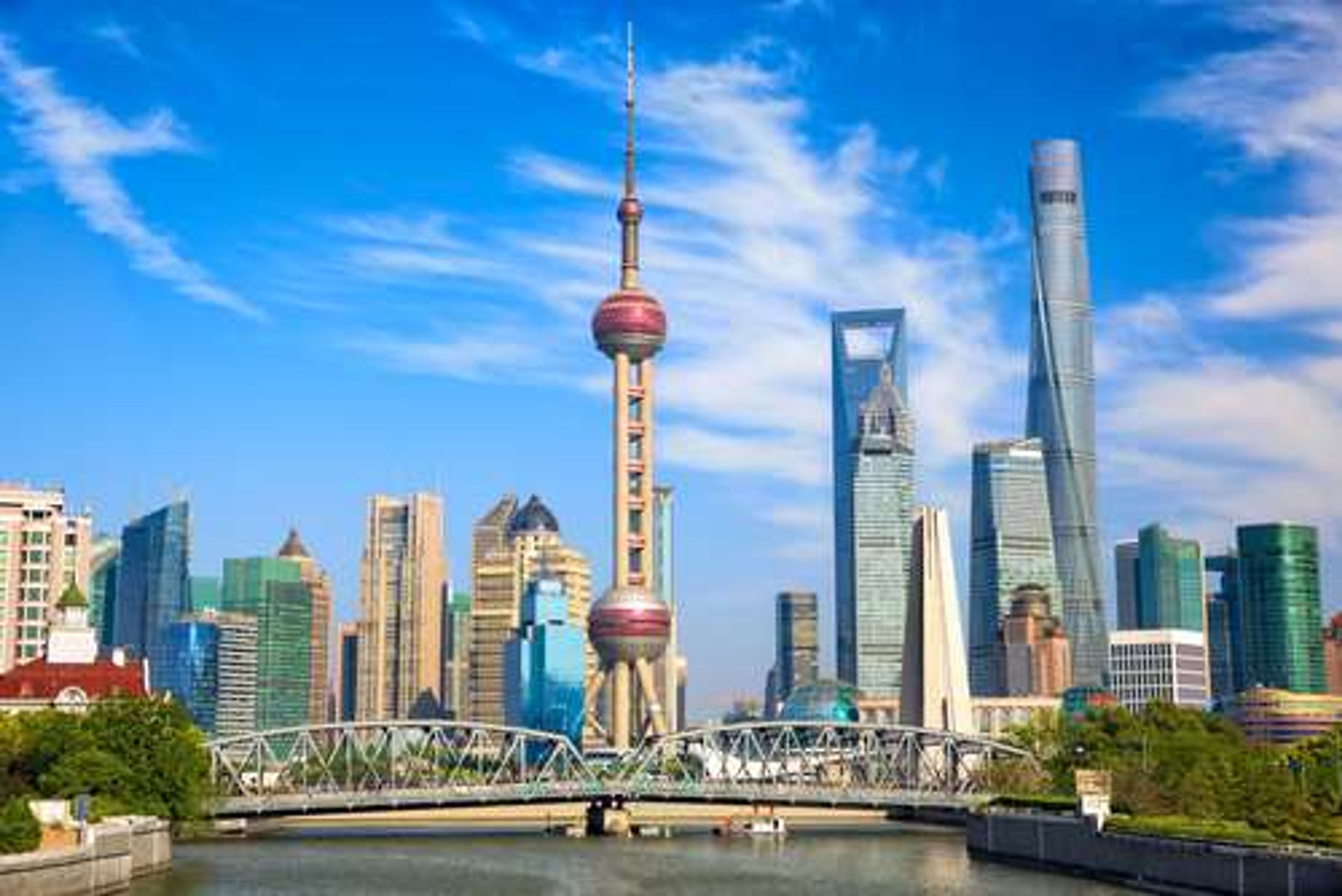 China Shanghai skyline with historical Waibaidu bridge