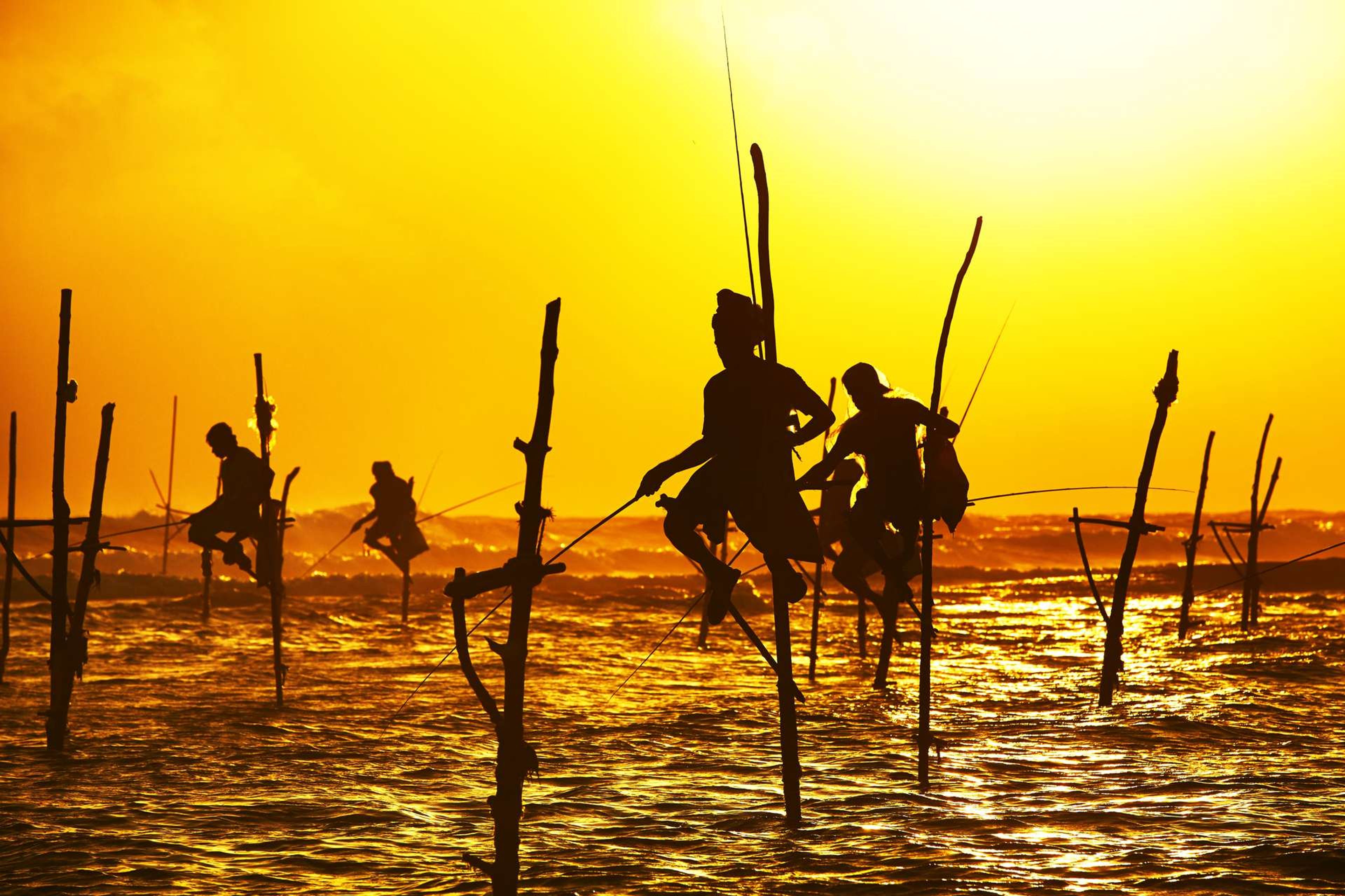 Sri Lanka Galle traditional fishermen at the sunset